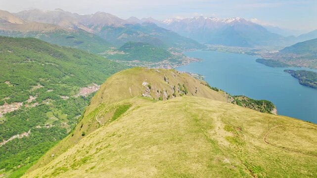 Como lake and San Bernardo church with Alps mountains on the horizon