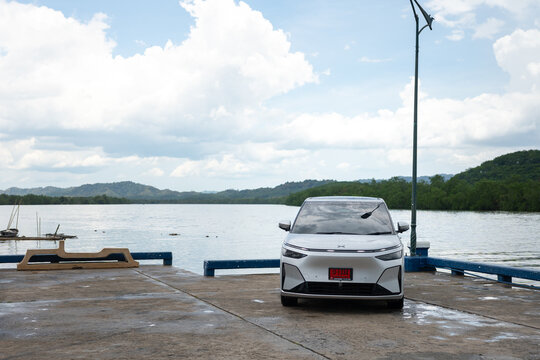 Thailand - 2 May 2026 : X Peng, top China famous technology EV car brand, is launch the new X9 as the ultra luxury MPV van with new intelligent chipset. The car is park with beuatiful rural place.