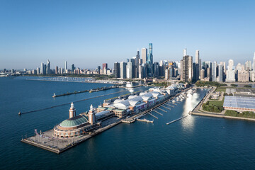 Aerial view of the skyscraper skyline of Chicago, Illinois, USA, with the backdrop of Lake Michigan and the Navy Pier. © Chenxiaoyang