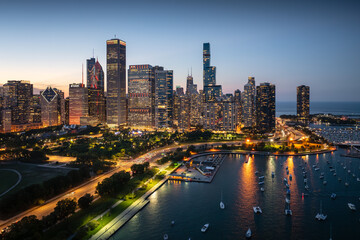 Fototapeta premium Aerial view of the night skyline of tall buildings in the city of Chicago, USA