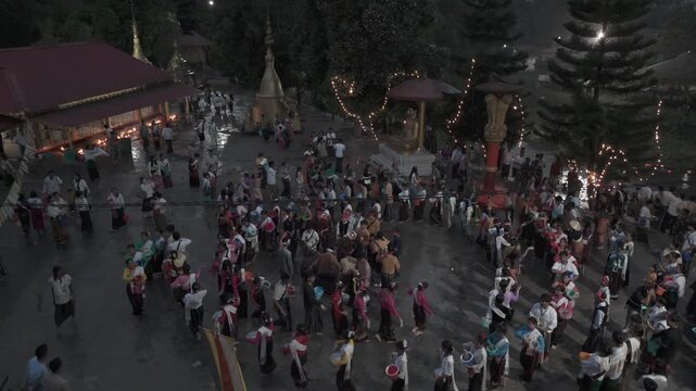  Night Aerial view of Sangken Water Festival celebrations at Golden Pagoda, Namsai, Arunachal Pradesh, India.
