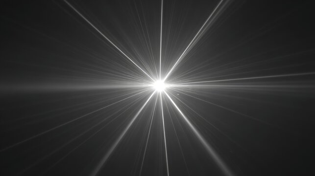 Bright, starburst-like light emanating from a central point against a dark background