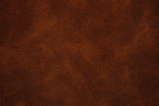 Closeup of brown suede texture for background and design Close up view of brown suede material surface details for backgrounds