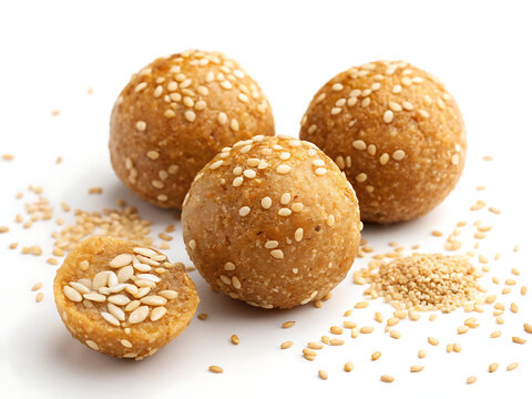 Makar Sankranti tilgul ladoo with sesame seeds, clean white background, realistic style