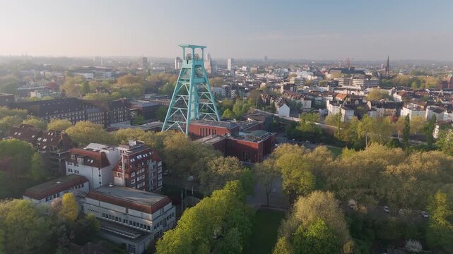 Drone flying around the historic headframe of the german mining museum in bochum, germany