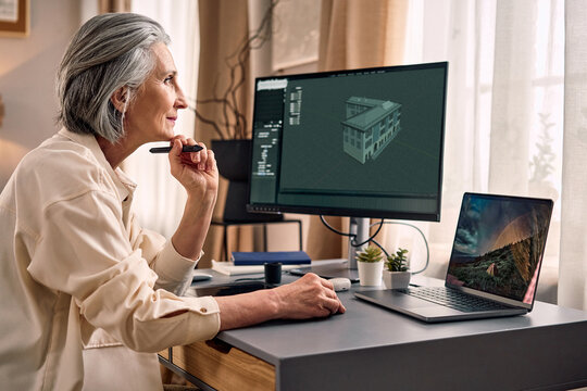 Senior woman working on architectural 3d model.