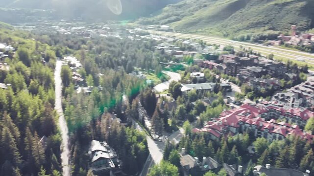 Vail, Colorado. Aerial city view on a beautiful sunny summer day. Slow motion