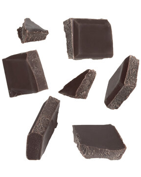 Isolated floating chocolate bar pieces in various angle. no background