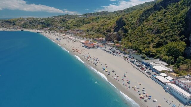 Aerial view of rock of the ulivarella, Tonnara di Palmi, Calabria, Italy. Slow motion