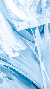 Abstract close-up of sharp ice shards and frozen water textures in cool blue and white tones, natural winter abstract, frosty and glacial patterns