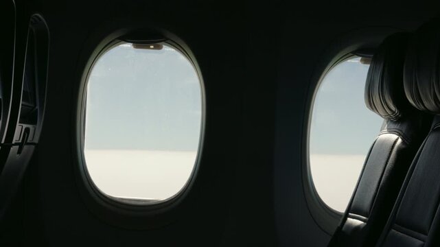 View from airplane window seat - slow motion 4K