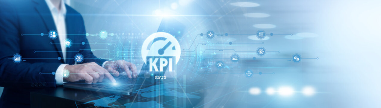 Project manager working on laptop. KPIs performance tracking. Leader evaluating team objectives and operational efficiency. Measuring business success through key performance indicators.
