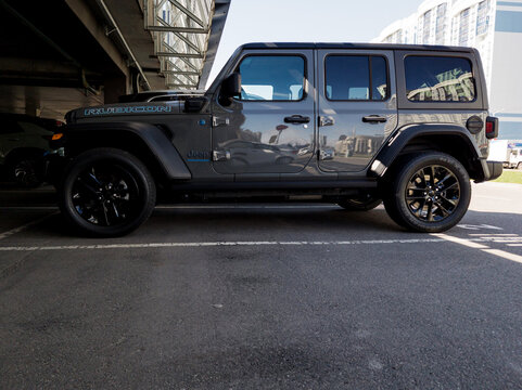 profile view of a grey four-door Jeep Wrangler Rubicon 4xe