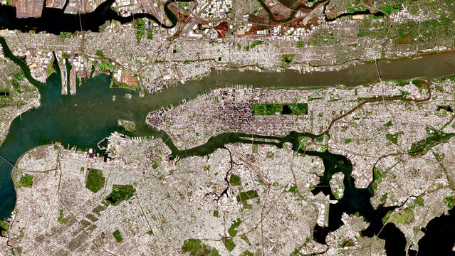 Satellite view of New York City illustrating dense urban infrastructure, transportation networks, and the Atlantic coastline. This image supports discussions on sustainable megacities