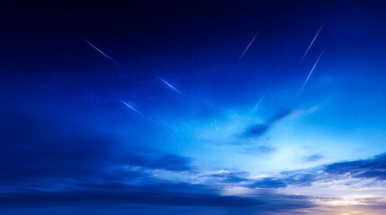 Fototapeta premium 深い青の夜空に降り注ぐ無数の流星群