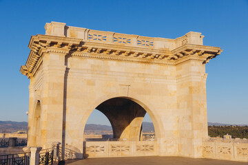 Obraz premium Saint Remy Bastion in Cagliari, Sardinia, Italy, displaying historic architecture and panoramic city views under a clear sky