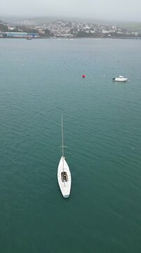 Aerial View of Teignmouth Beach and Ocean Town of England United Kingdom. High angle Vertical Footage Was Captured with Drone Camera During Windy and Rainy clouds over British Tourist Attraction of UK