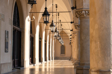 Kraków Sukiennice Cloth Hall gothic arcades in the early morning hours, Sukiennice, Krakow Main Market Square, Krakow Old Town, Krakow, Poland © Aneta
