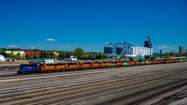 Minneapolis, Minnesota, USA - A line of retired BNSF and other locomotives are parked at Northtown yard on a sunny spring day