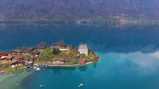 Droneshot of Iseltwald, canton Bern at Brienzersee during spring.