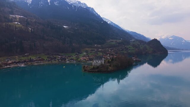 Droneshot of Iseltwald in canton Bern at the lake Brienzersee during Spring (Switzerland).