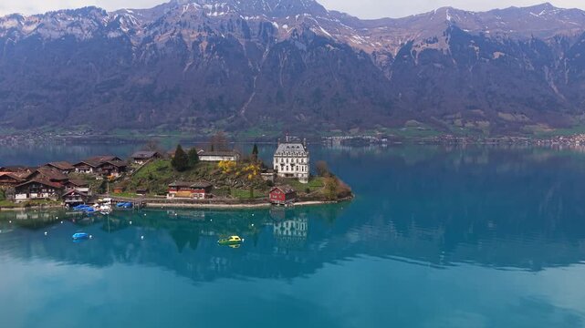 Orbitshot with the Drone of Iseltwald in Switzerland during Spring.
