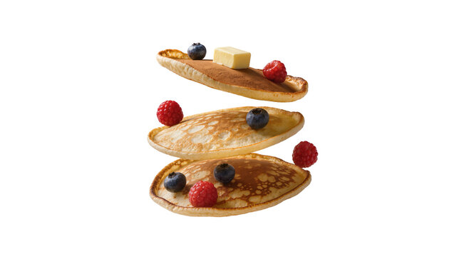Stack of three golden pancakes with butter raspberries and blueberries, isolated on transparent background