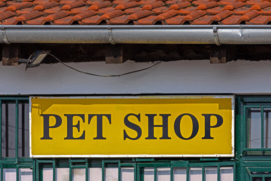 Pet shop sign on building facade in Belgrade street