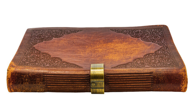 Antique leather-bound book with ornate embossed cover and brass clasp, isolated on transparent background
