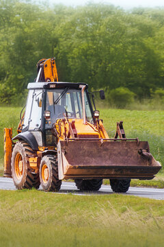 Road repair equipment in agricultural environment