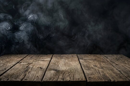 old wooden table on dark background