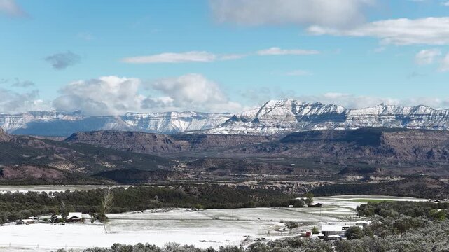Aerial of snowy mountain landscape of Book Cliffs in Mesa Colorado in spring