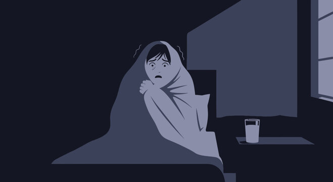 A Person Huddled In Bed Experiencing Fear During The Midnight Hours