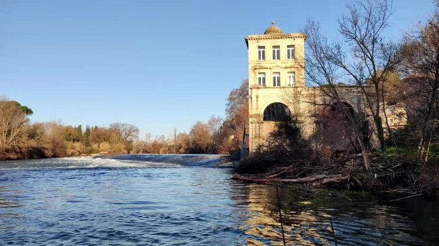 Video of the Ancien Moulin de Bagnols, also known as Moulin Cordier, on the banks of the Orb River in the city of B&eacute;ziers, France
