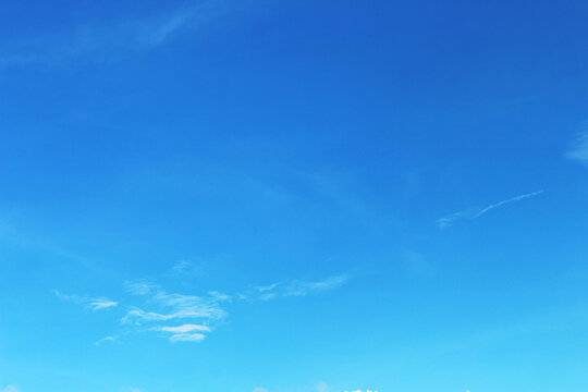 Bright blue sky and cloudy for graphic design or wallpaper.