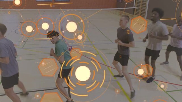 On drill cue five men doing sports footwork training with pulsing orange graphics overlaying group