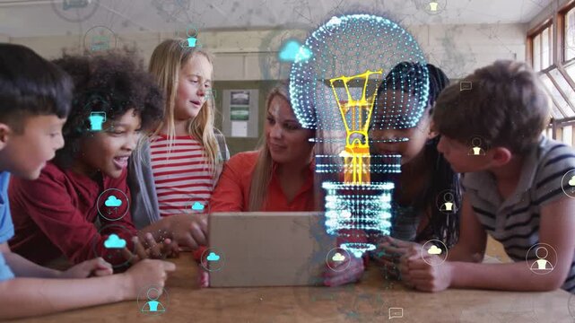 Teacher tapping tablet and guiding students in class while AR bulb and clouds forming over tablet