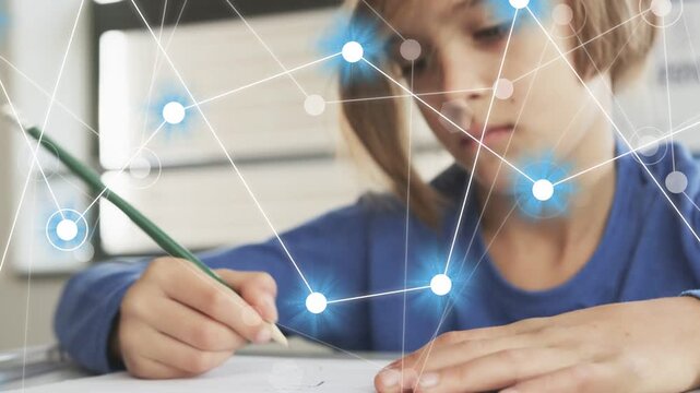 Boy writing green-pencil, camera pulling back and causing network overlay across hands for school