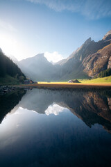Naklejka premium Switzerland alpine mountain scenery at Seealpsee lake, Appenzellerland region, Switzerland