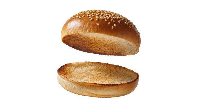 Golden brown sesame seed burger buns toasted inside, isolated on transparent background