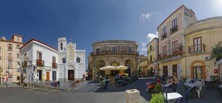 Piazza della Rebubblica with old historical house facades and the church Chiesa dellImmacolata of the town of Pizzo, Pizzo, Calabria, Italy