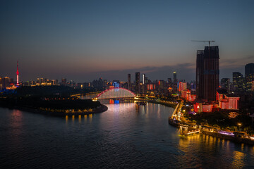 Obraz premium Night view of Wuhan, Hubei, China's city skyline and landmarks