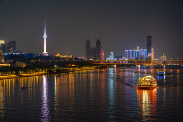 Naklejka premium Night view of Wuhan, Hubei, China's city skyline and landmarks