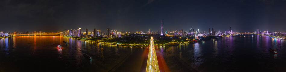 Naklejka premium Night view of Wuhan, Hubei, China's city skyline and landmarks