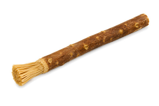 Traditional Miswak Stick on White Background &ndash; Natural Teeth Cleaning Wooden Brush Isolated