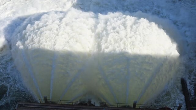 Powerful water discharge from Hume Dam at Albury supporting flood mitigation