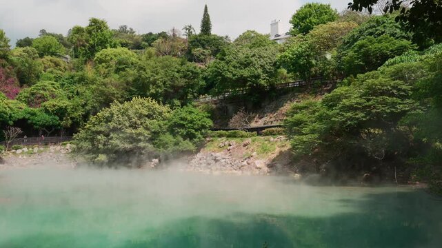 Steaming Beitou Thermal Valley Lake Surrounded by Lush Forest