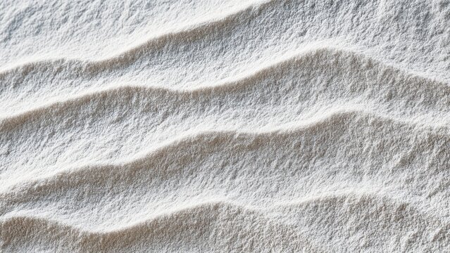 Clean minimalist background featuring soft white granules in elegant wavy textures and subtle shadows.