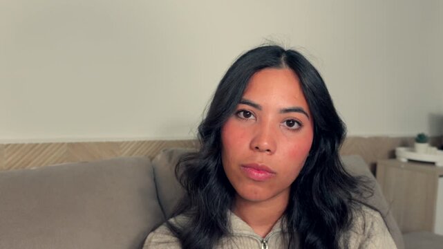 Real Woman Making Annoyed Face and Expressing Indifference and Skepticism During Online Conversation 4K