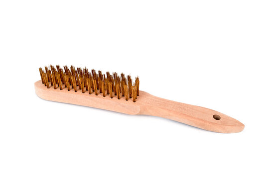 a wooden wire brush with brass bristles